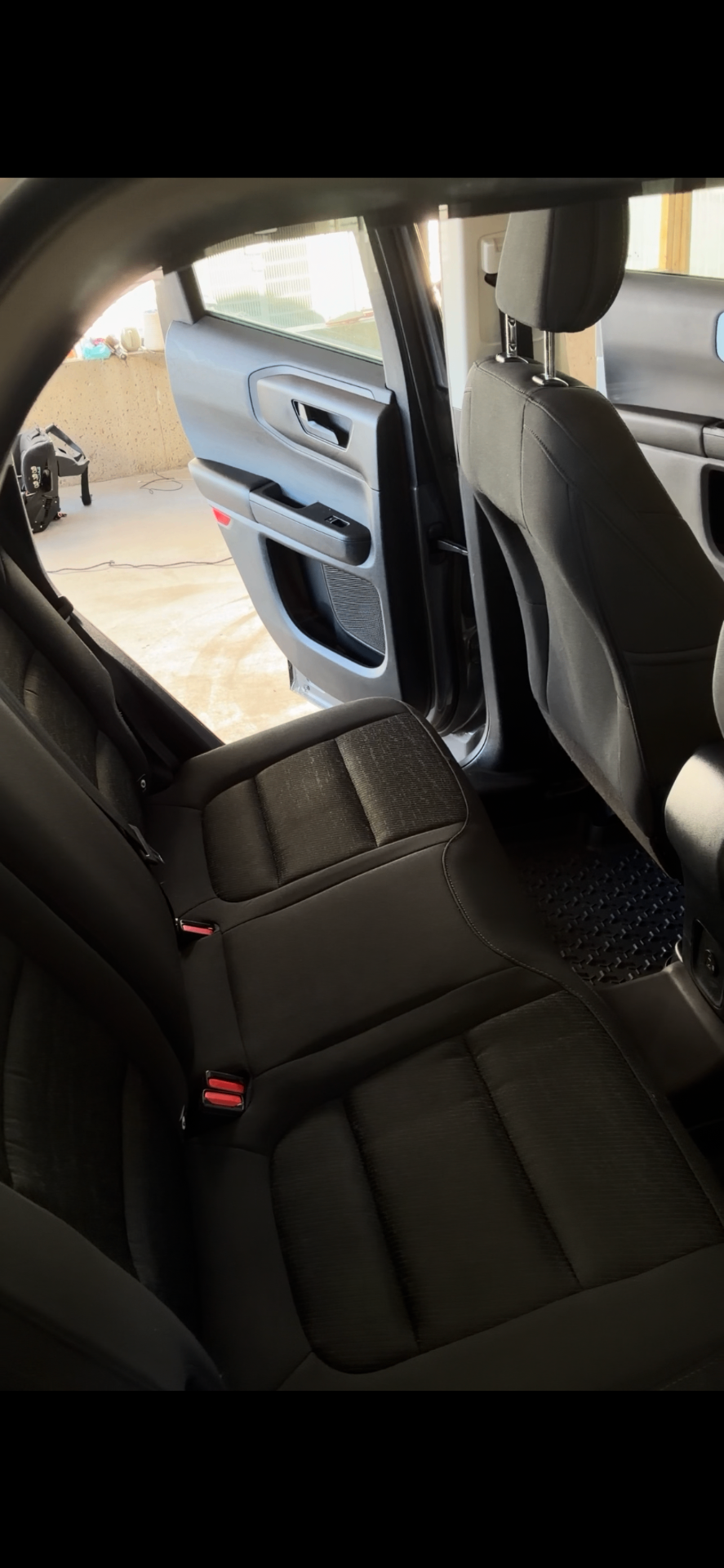 BMW 540i rear fabric seats fully cleaned and restored after professional interior detailing